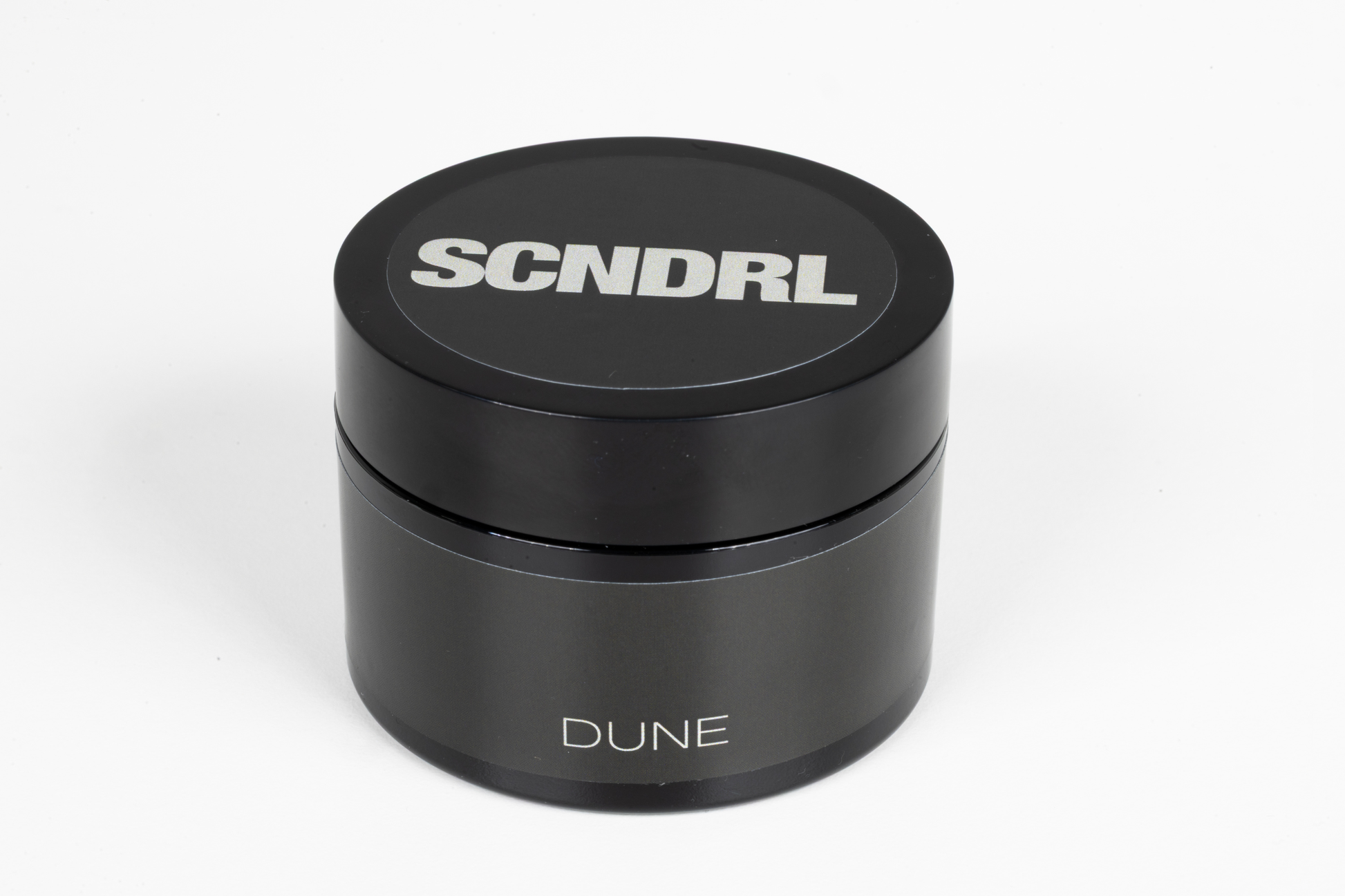 Black container with 'SCNDRL' branding on a white background